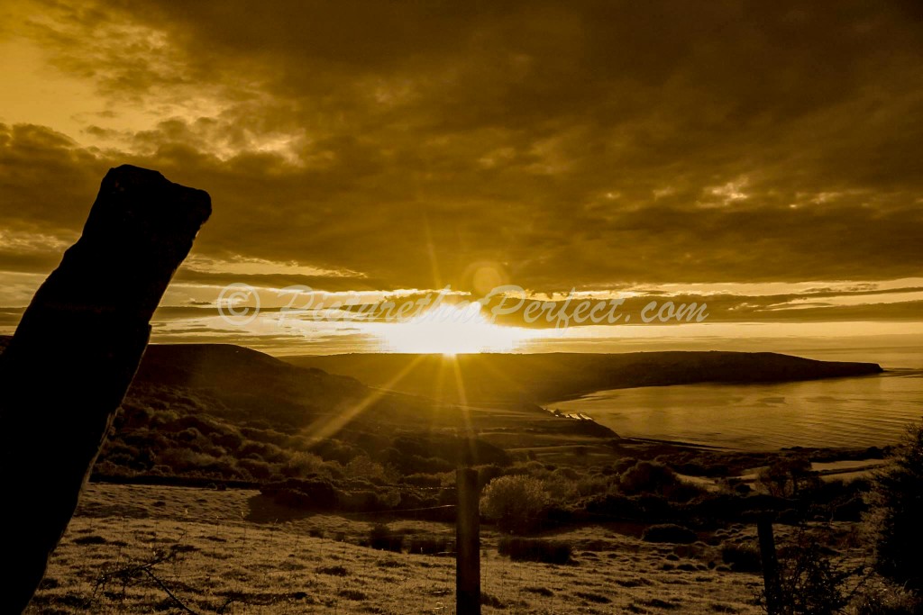 Bay with stone twilight orange